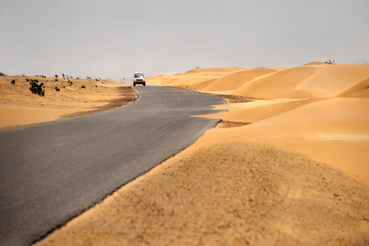 overlanders on a desert road, can still sleep in comfort, with a quick setup light weight roof top tent. Drive through the sand dunes, cook over the fire in a quality fire pit, stargaze, then sleep well..