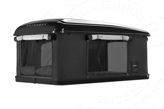 Autohome Airtop plus, a better roof top tent than James Baroud, blacked out black fiberglass with Airtex fabric. 3/4 view. Roll up doors and light weight under 60kg. Overlanders Australia