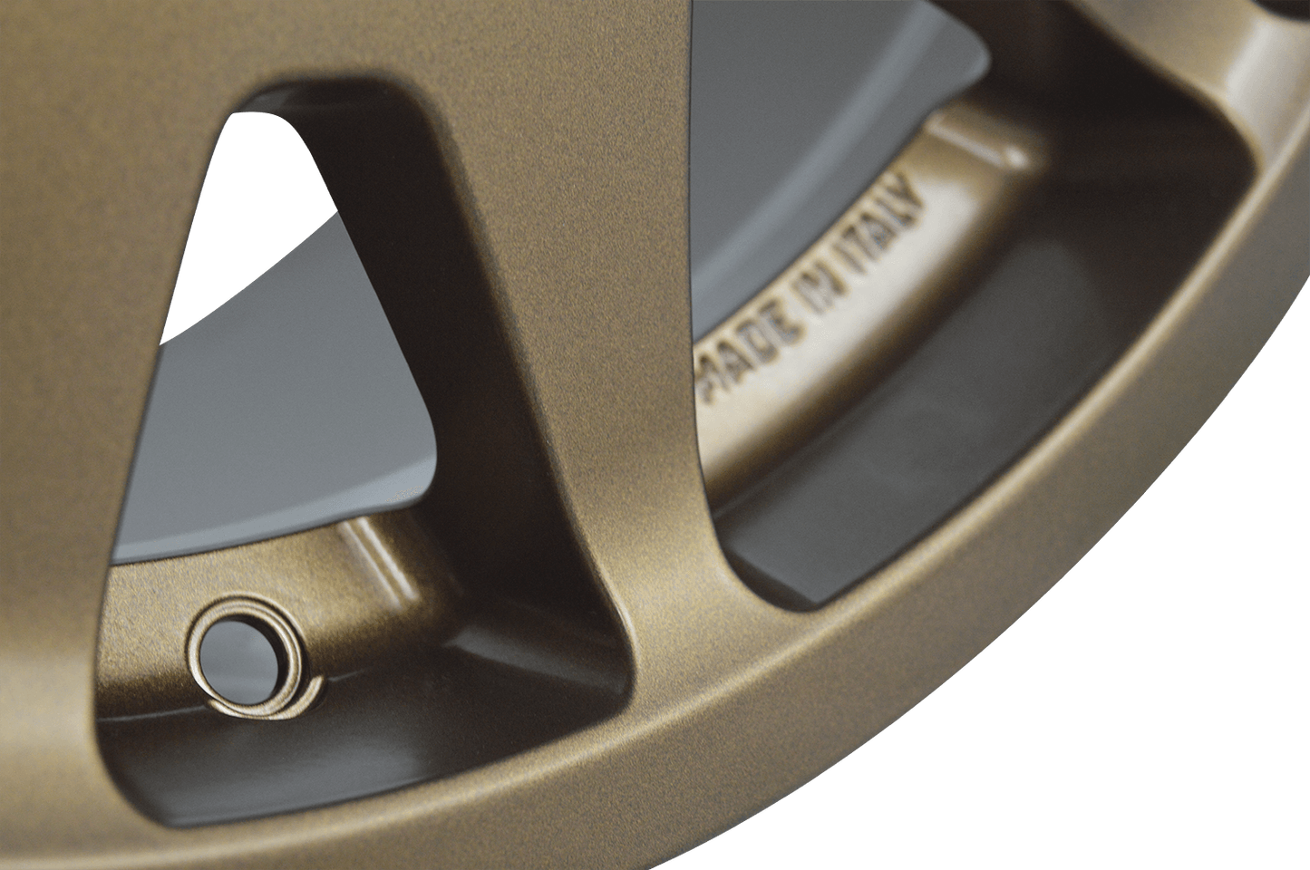 super close-up Ineos Grenadier alloy wheel for the grenadier, matt bronze close-up by Evo Corse, made in Italy, 17 x 8 inch 45 offset, an alloy race wheel off-road best offset and load rating for the grenadier by Ineos , suits BFG Toyo Falken Good Year etc