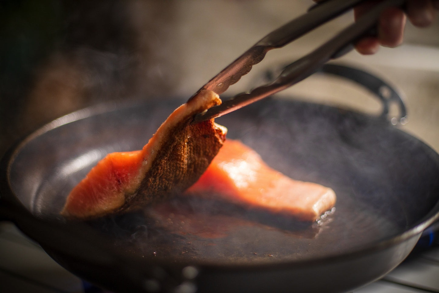 35cm Seasoned Iron BIGGA Skillet quenched for non-slip surface, durable nonstick pans, made in australia, great for camping over the fire cooking outdoors or at home. salmon seared steaks by solid teknics