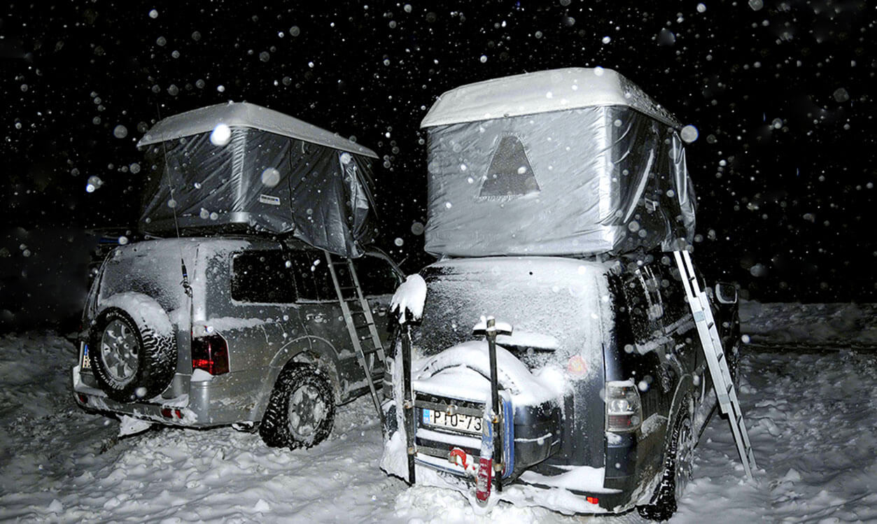 winter hood for the best hard shell roof top tent in australia, made in italy by autohome, hardcore camping in the snow snow
