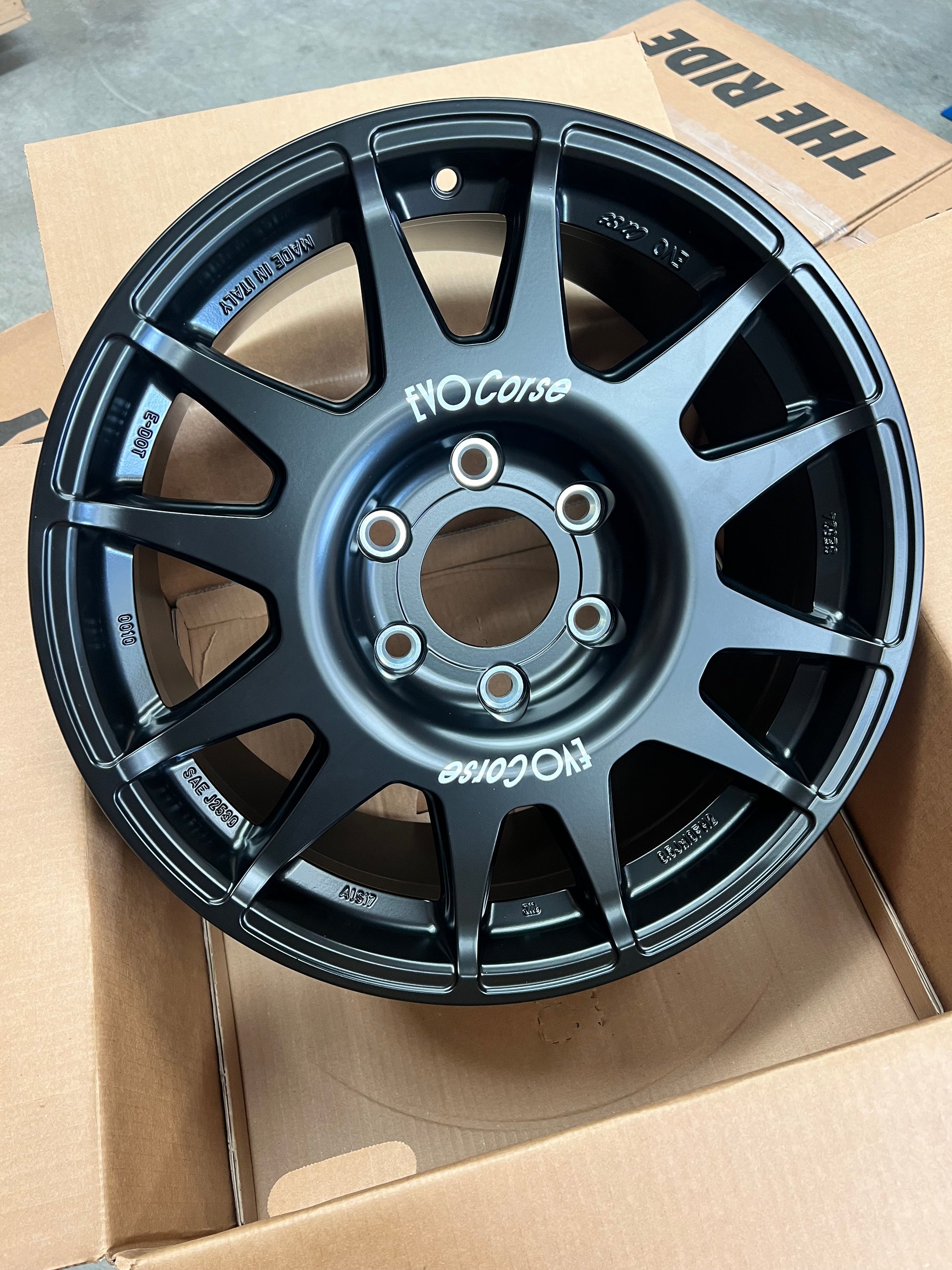 Ineos grenadier or J300 alloy wheel the offset that comes to the edge of the guard. Rally 18 x 8.5 with a positive 45 offset. Also, for land cruiser 300 series, with a 47 offset. Best wheel for all terrain tyres. Like BFGoodrich of Falken 275 65 r18. High strength for GVM upgrade. Evo Corse, made in Italy. Pictured here in box from Overlanders, Matt black colour.