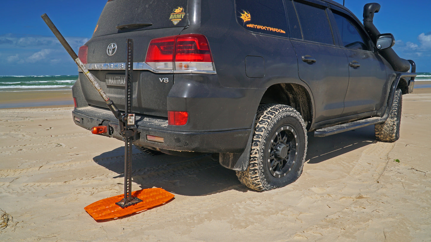 maxtrax mini jaxbase orange overlanders traction aid in a compact package. use them in the sand