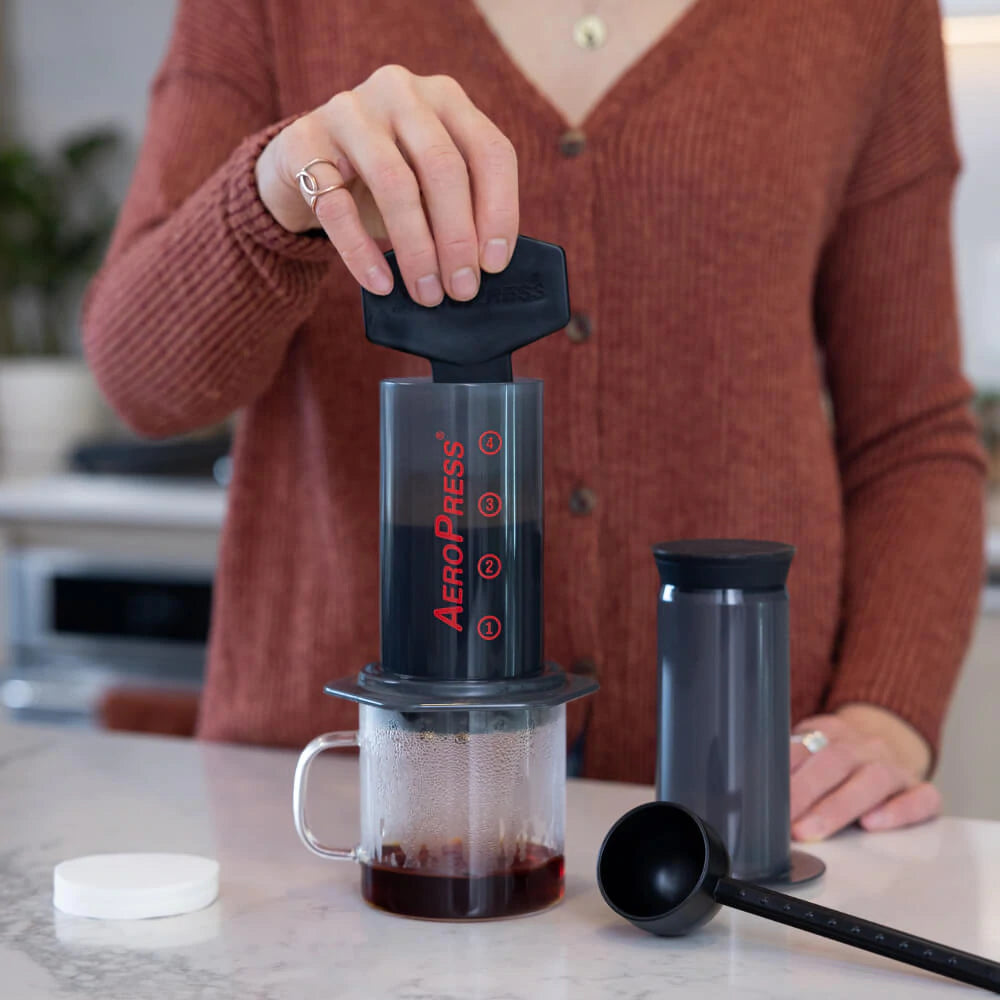 Aeropress coffee maker, in the kitchen. A camp coffee equipment main stay, for coffee on the go. Use fresh ground coffee for best results. Enjoy coffee at camp, next to the fire.