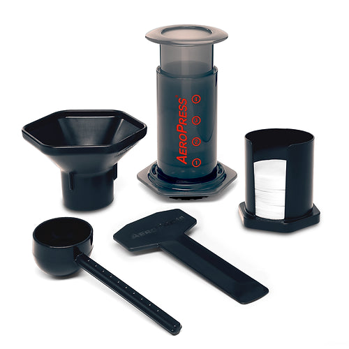 Aeropress coffee maker set of parts, perfect for coffee at camp. A camp coffee equipment main stay, for coffee on the go. Use fresh ground coffee for best results. Enjoy coffee at camp, next to the fire.