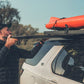in use with man and kayak shot of front runner pro camp and prep table kit australia melbourne stainless camp table, the best and sturdiest and strongest, store under a roof rack slide it out the way